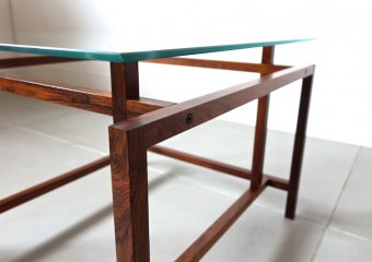 Glass top table by Henning Norgaard
