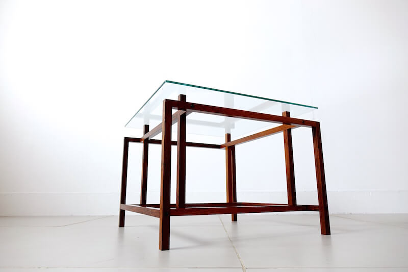 Glass top table by Henning Norgaard