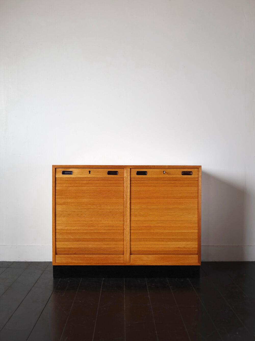 Danish vintage roll-front cabinet